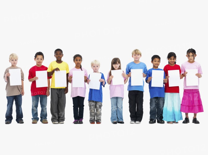 Children holding paper. Photographer: momentimages