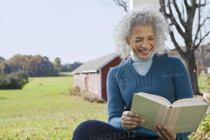Woman reading a book. Photographer: Pauline St.Denis