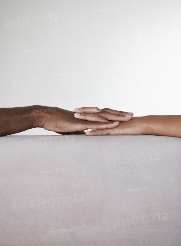 Holding hands. Photographer: momentimages
