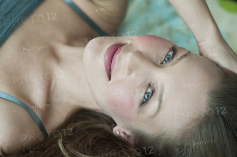 Woman lying down.