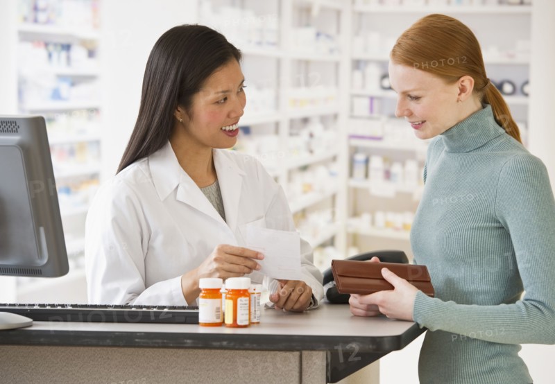 Pharmacist and customer.