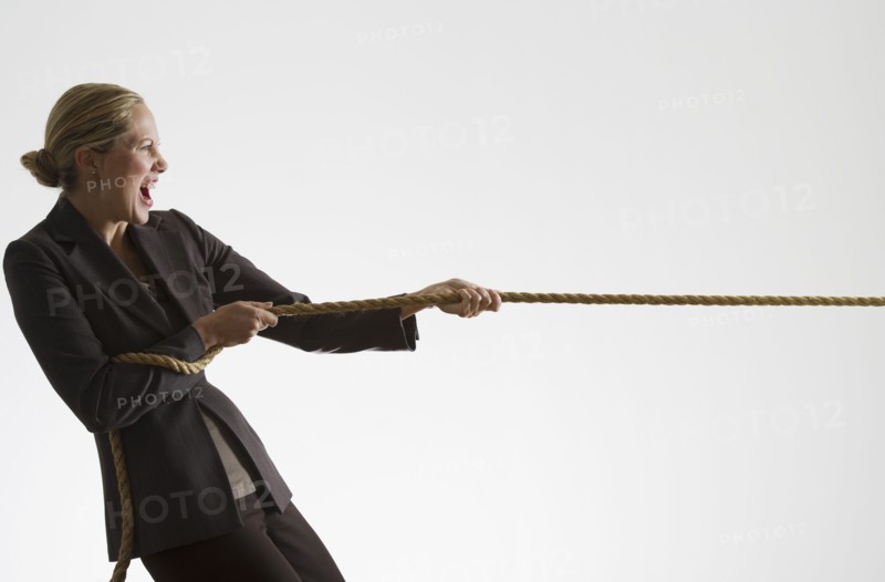 Woman pulling a rope.