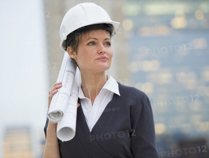 Female architect on construction site.