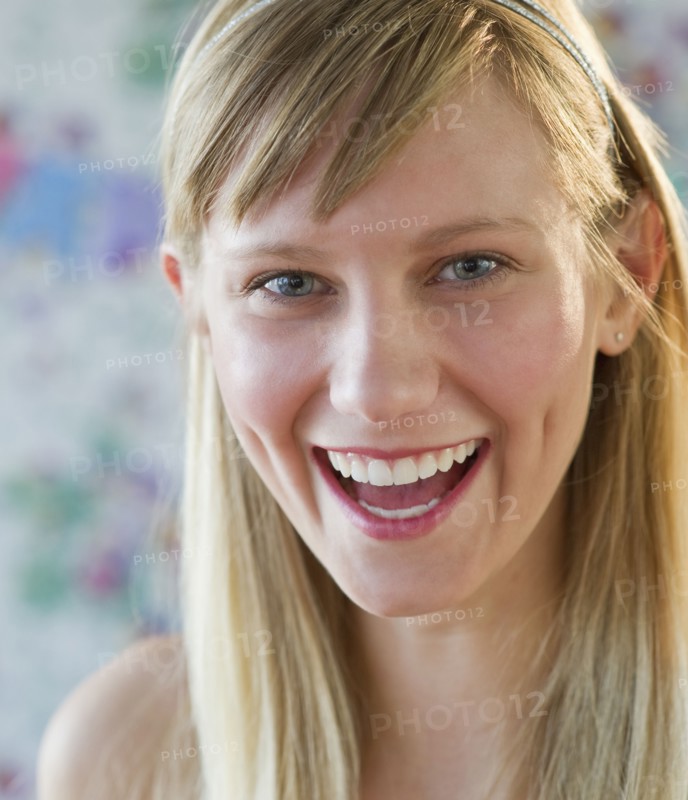 Young woman laughing.