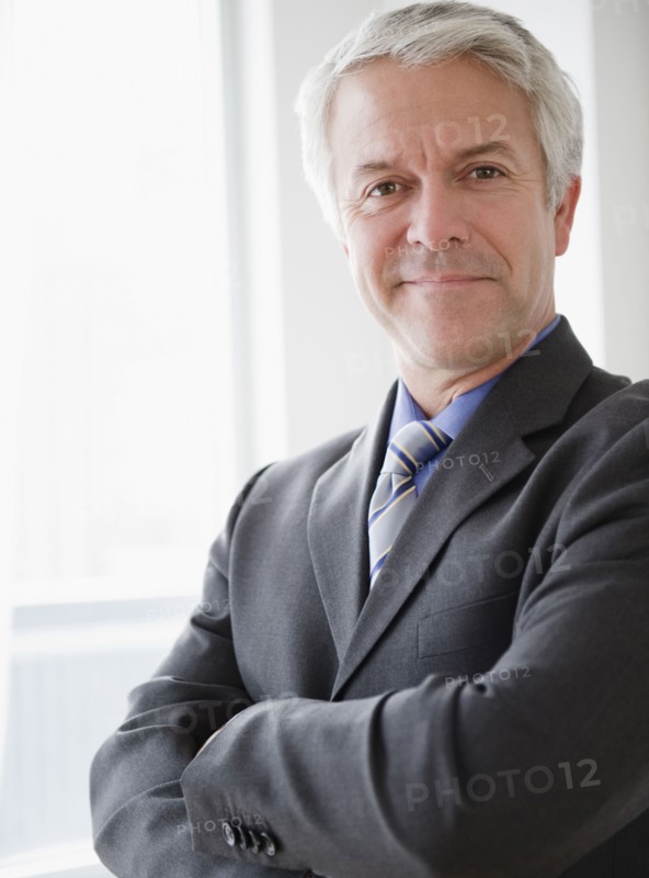 Confident businessman. Photographe : Jamie Grill