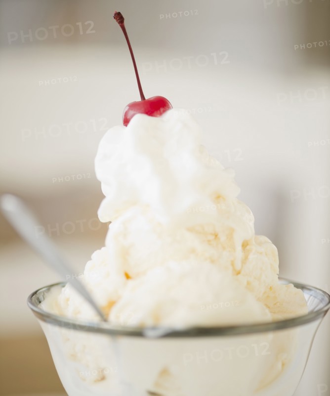 Ice cream with a cherry on top. Photographe : Jamie Grill