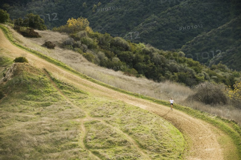Person running on trail.