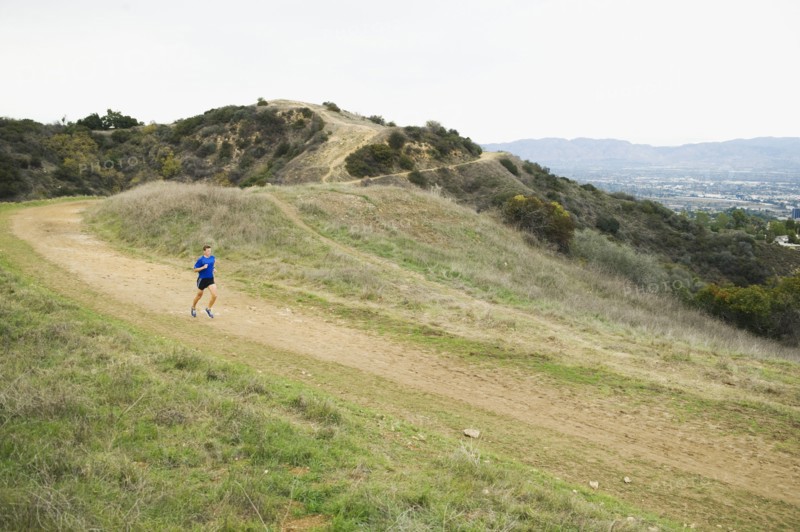 Person running on trail.