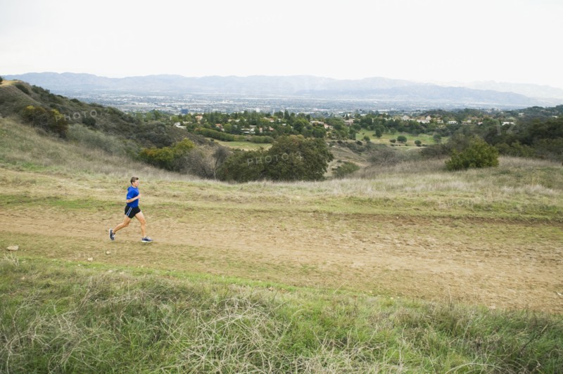 Person running on trail.