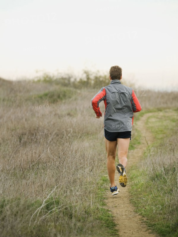 Person running on trail.