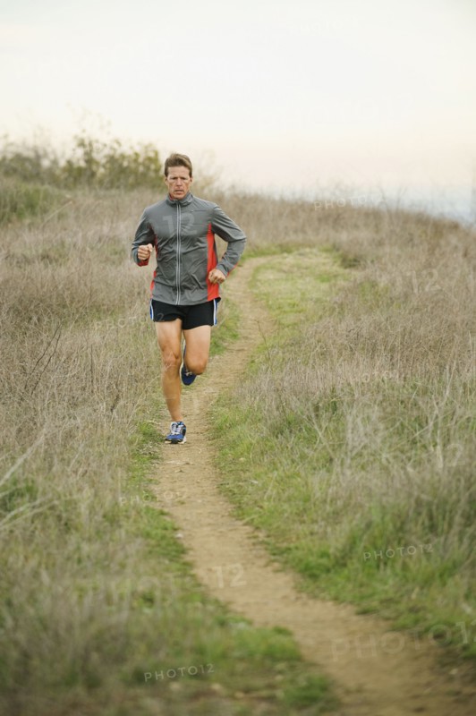 Person running on trail.