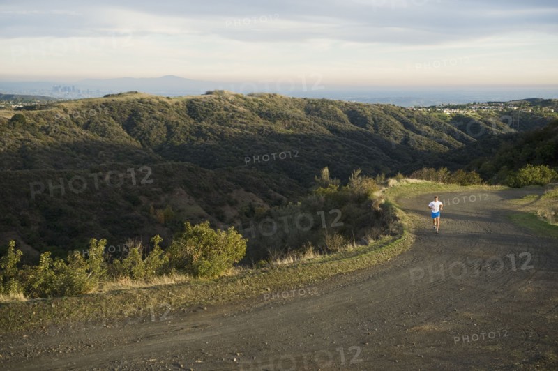 Person running on trail.