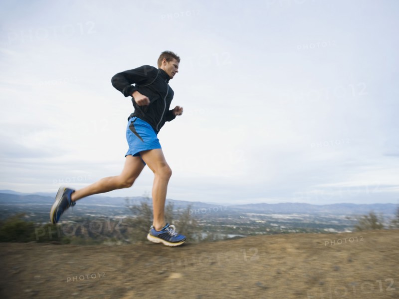 Person running on trail.