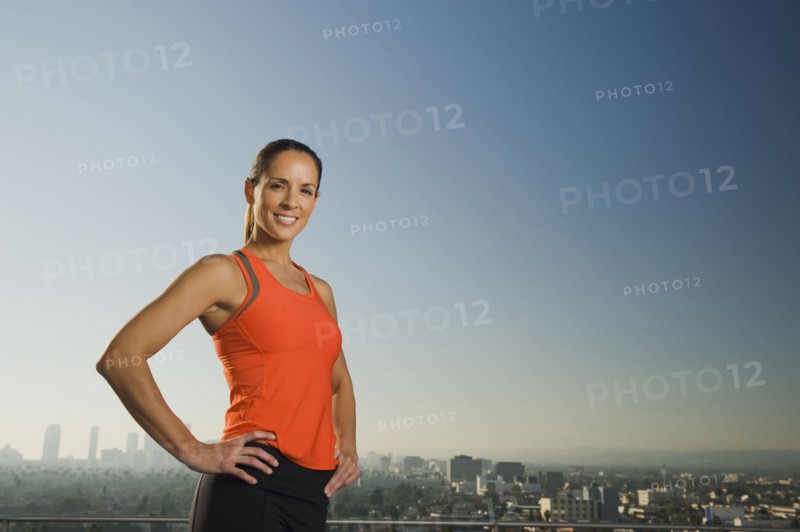 Woman wearing exercise clothing.