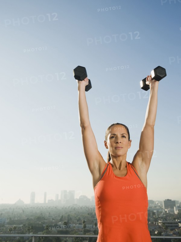Woman doing weight training.
