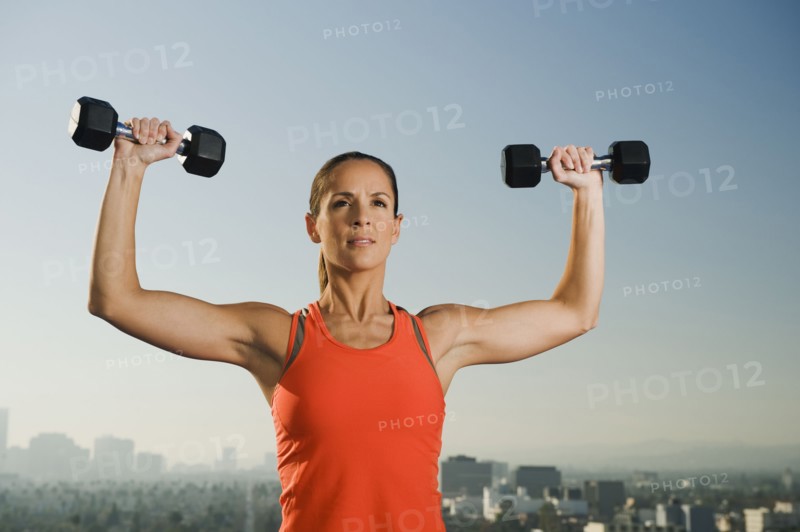 Woman doing weight training.