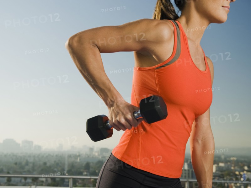Woman doing weight training.