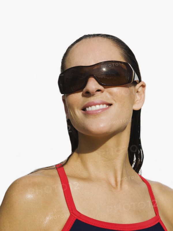 Woman wearing sunglasses.