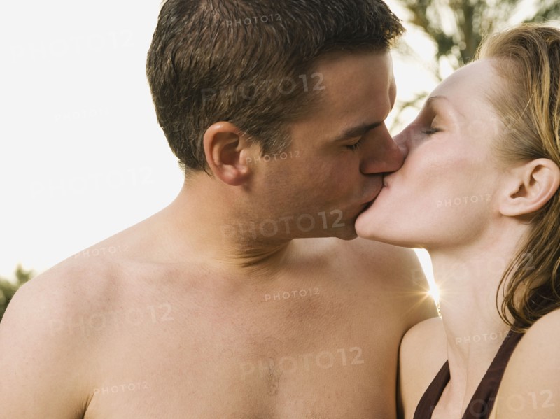 Couple kissing.