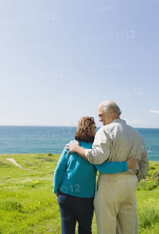 Couple looking at the ocean.