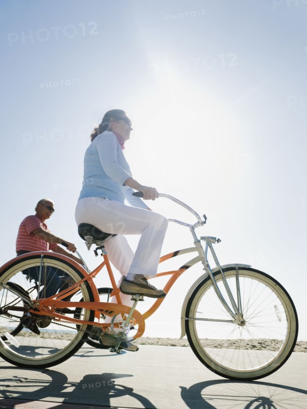 Couple riding bicycles.