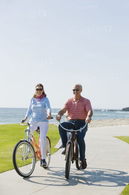 Couple riding bicycles.