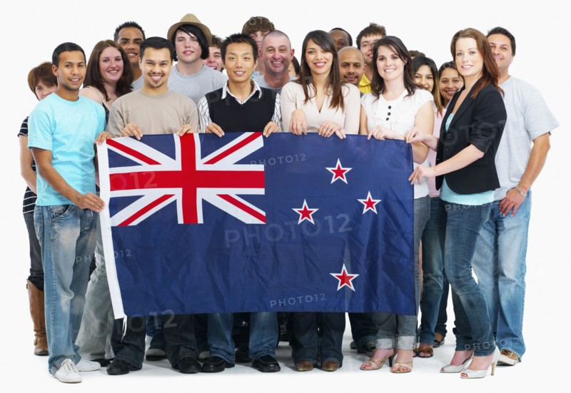 Group of people holding Australian flag. Photographe : momentimages