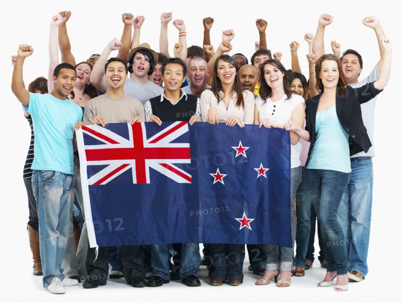 Group of people holding Australian flag. Photographe : momentimages