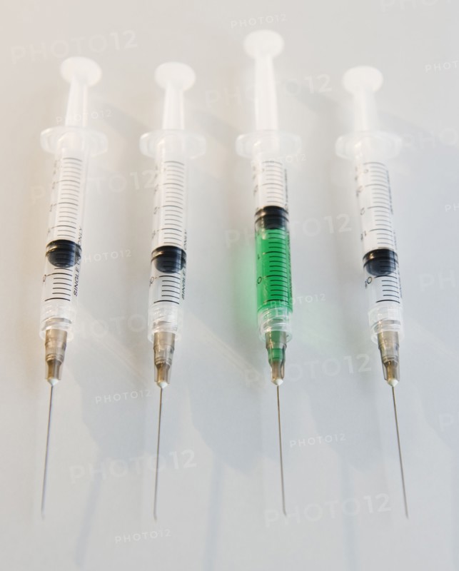 Four syringes. Photo : Jamie Grill