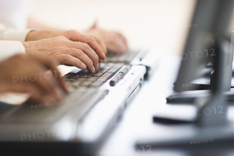 Employees working at computers.