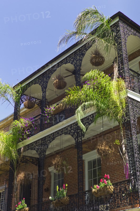 Ornate balconies on building in New Orleans.