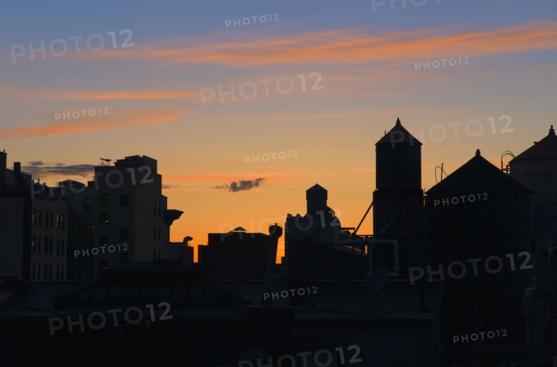 New York City skyline at dusk.