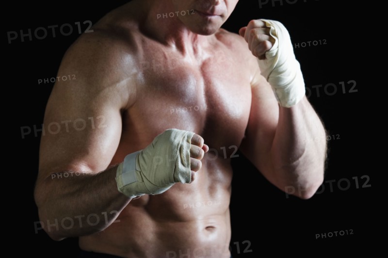 Boxer with taped hands. Photo : Daniel Grill