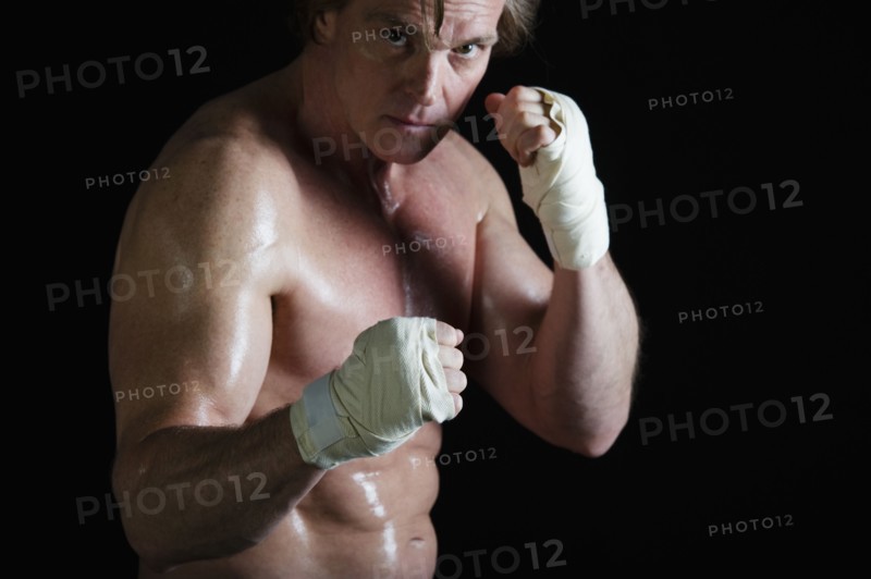 Boxer with taped hands. Photo : Daniel Grill