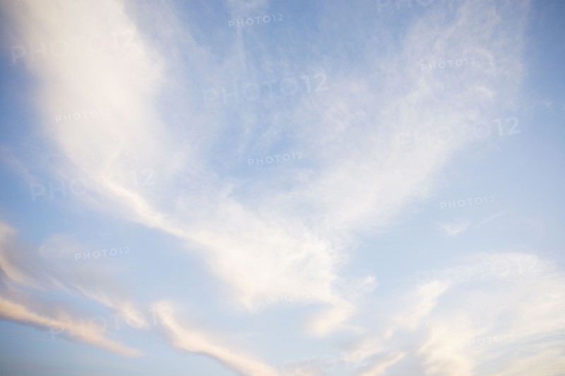 Clouds sunlight and blue sky. Photo : Chris Hackett