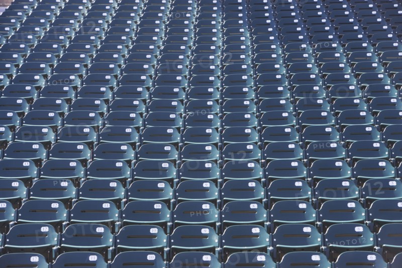 Empty bleacher seats. Photo : fotog