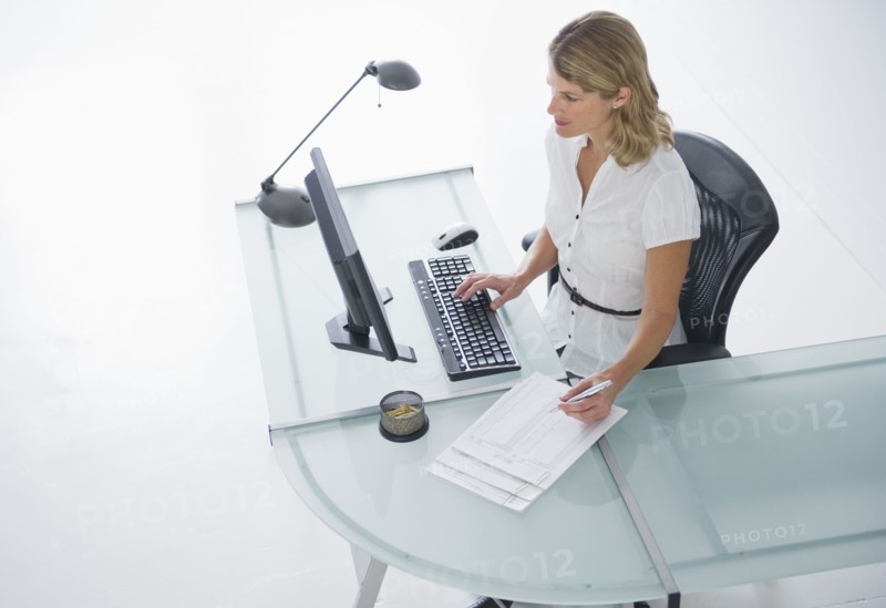Businesswoman working on computer.