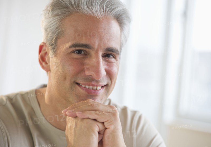 Portrait of a grey haired man.