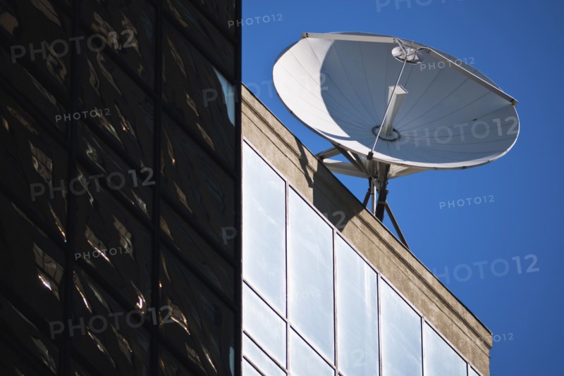 Satellite dish on top of building.