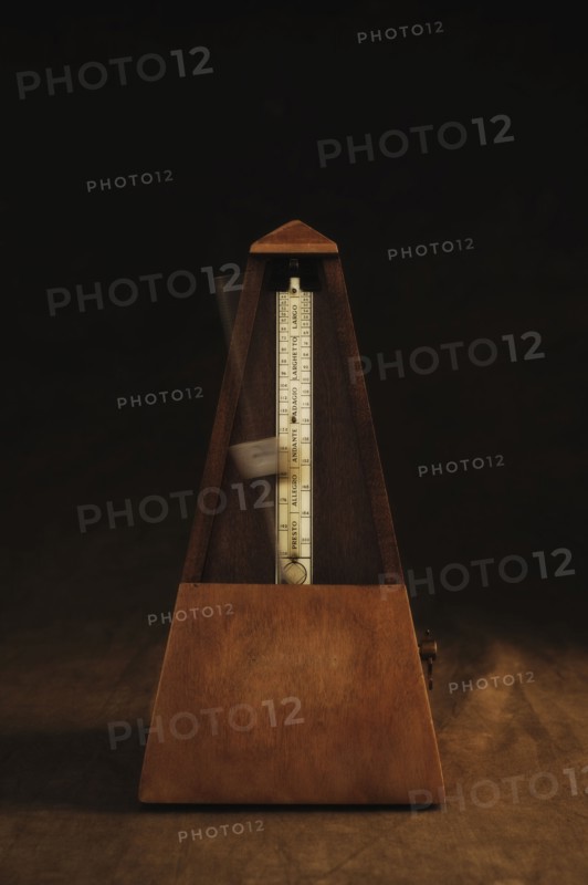 Antique metronome.