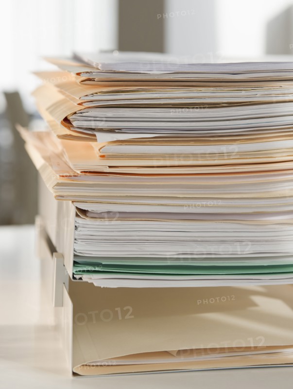 Stack of paperwork. Photo : Jamie Grill