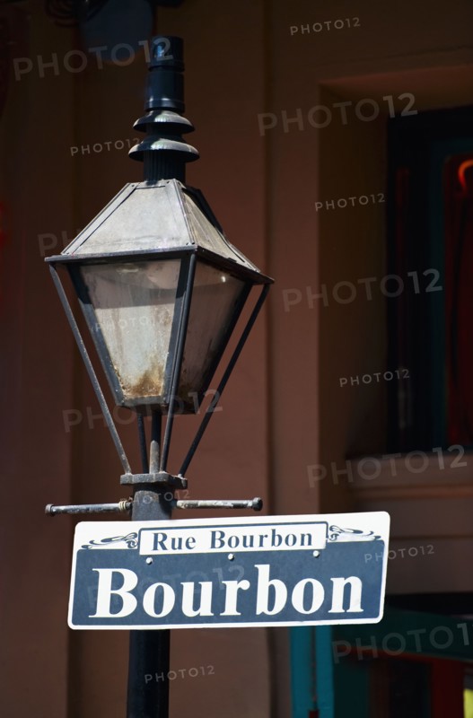 Lamp post and Bourbon Street sign in New Orleans.