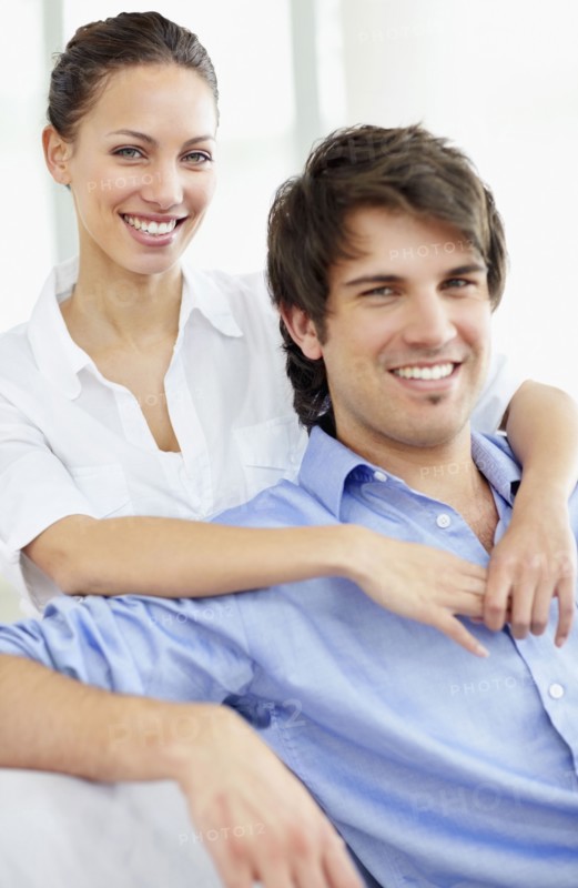 Couple relaxing together. Photo. momentimages