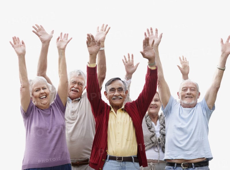 Group of senior with their arms raised. Photo. momentimages