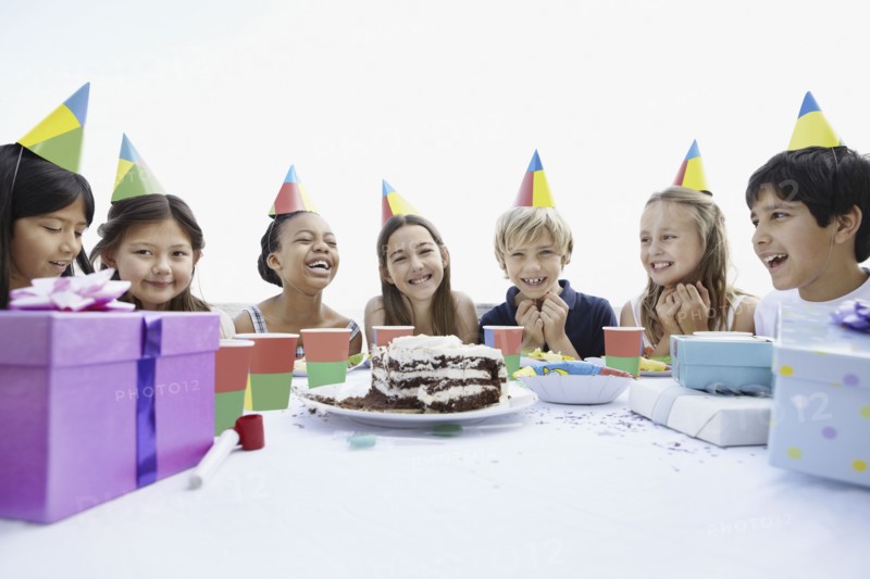 Group of children at a birthday party. Photo. momentimages