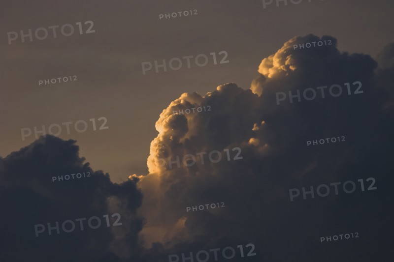 Sunset behind clouds. Photo. Antonio M. Rosario