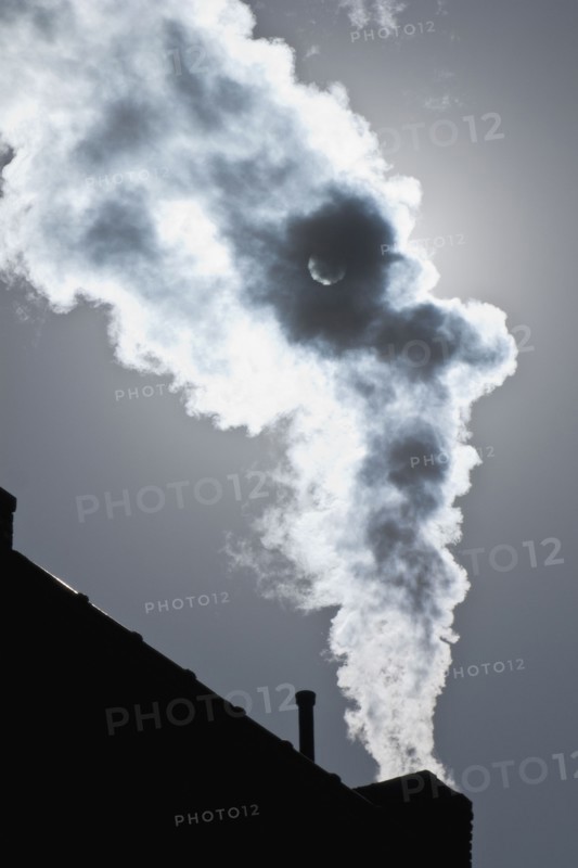 Smoke coming out of factory chimney. Photo. Antonio M. Rosario