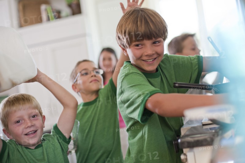 Group of children in kitchen. Photo. Tim Pannell