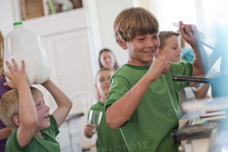 Group of children in kitchen. Photo. Tim Pannell