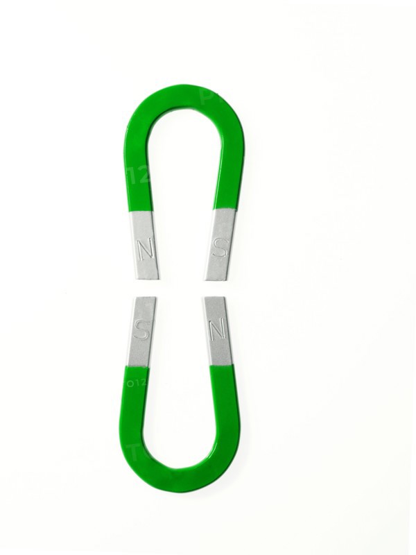 Two green magnets. Photo. David Arky